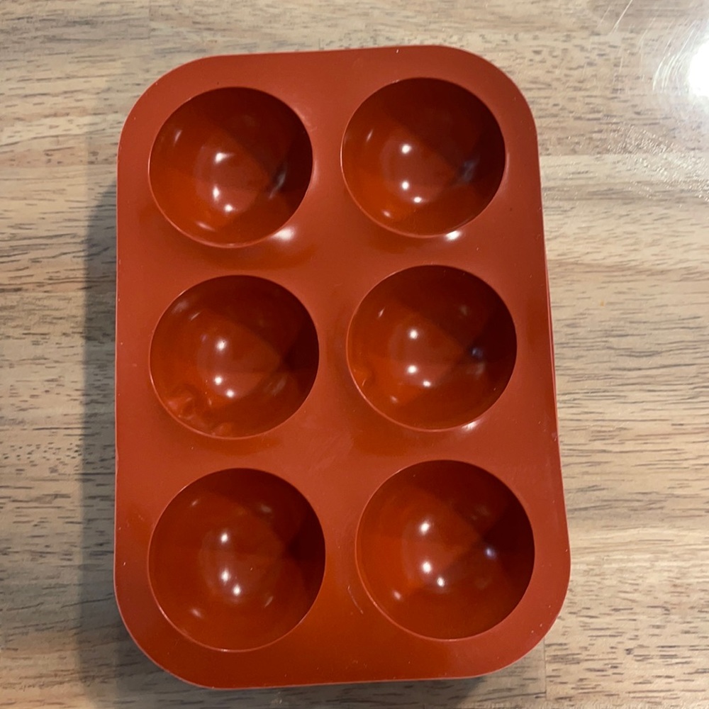 Silicone molds, chocolate bomb molds.